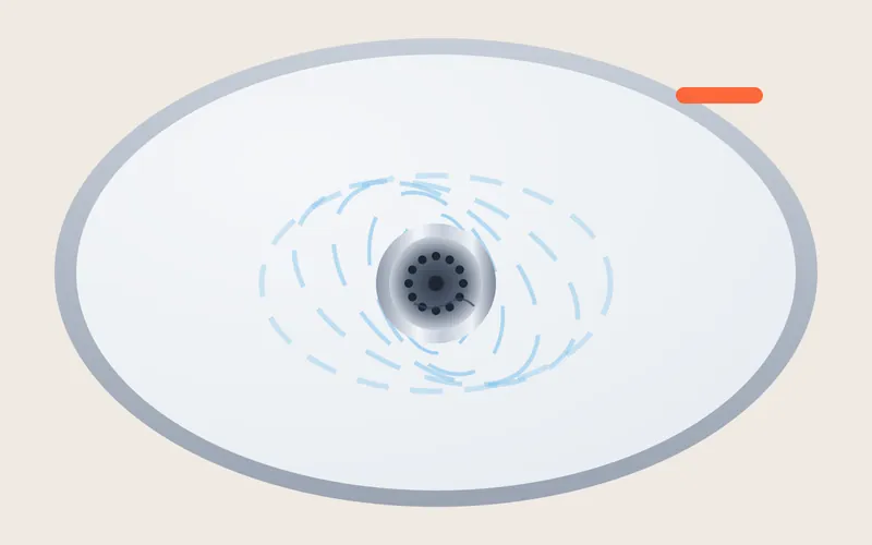Illustratie van een wastafel van bovenaf met een afvoerputje en ronddraaiend water